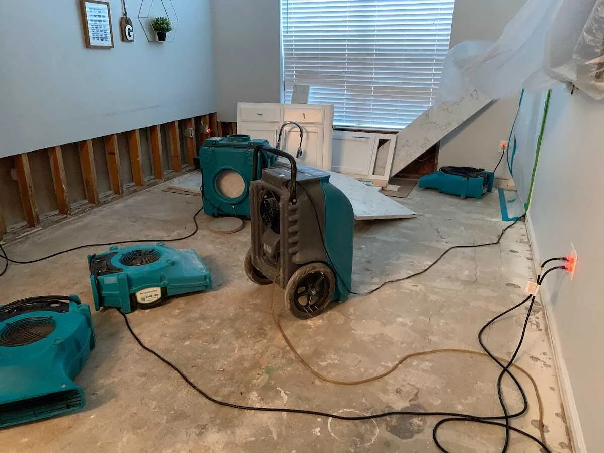 Dehumidifier in flood-cut room for Water Damage Restoration in Kirtland